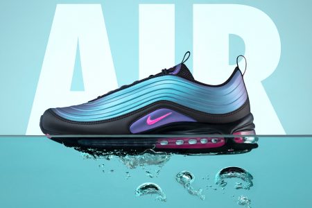 Nike Air Max 97 LX floating in Water above O2-bubbles.